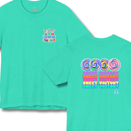 Turquoise t-shirt with colorful graphics on a white background