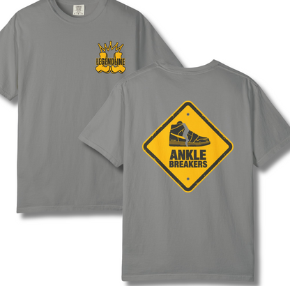 Gray t-shirt with yellow and black graphic design on a white background